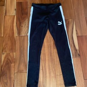 Black puma pants with white on the sides